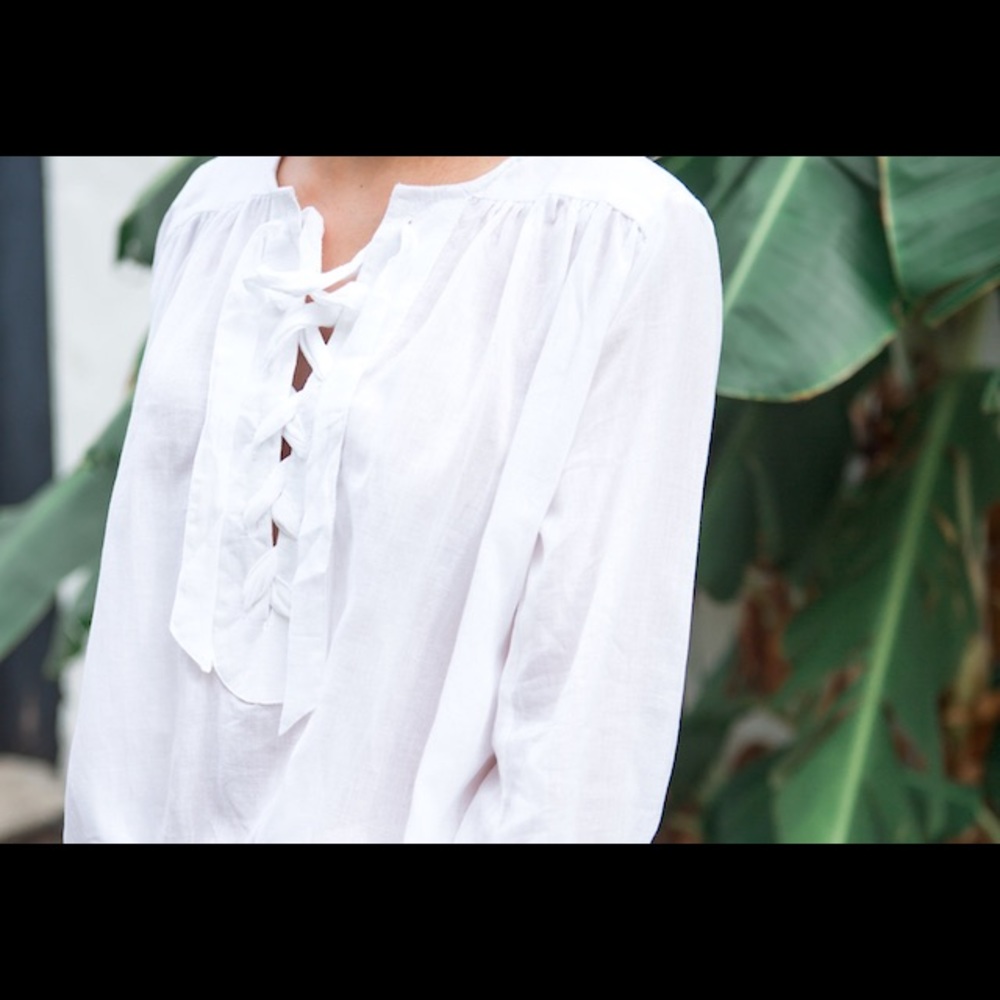 Faithfull white lace up blouse with bell sleeve size 4
